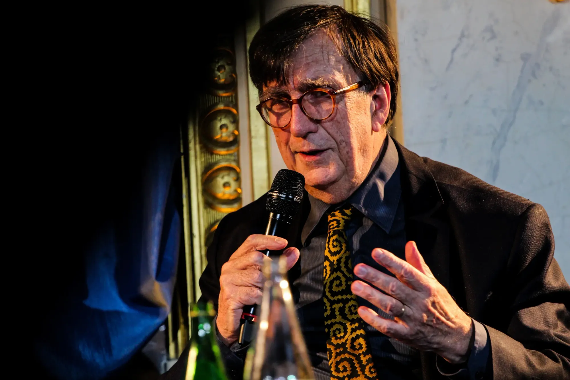French philosopher Bruno Latour speaking at an event.